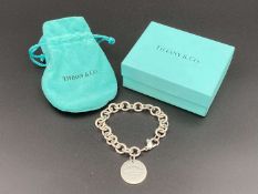 TIFFANY & CO, &nbsp;.925 silver “RETURN TO TIFFANY” charm bracelet,