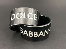 DOLCE & GABBANA, a pair of vintage acrylic cuff bangles