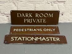 Three Bronze Signs&nbsp;