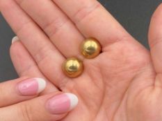 Pair of unmarked, ½ round ear studs