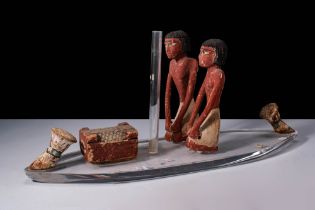 EGYPTIAN WOODEN FIGURINES FROM A CEREMONIAL BOAT