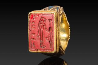 EGYPTIAN HIGH KARAT GOLD INLAY RING WITH GLASS INTAGLIO DEPICTING SEKHMET