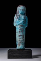 EGYPTIAN BICHROME FAIENCE USHABTI