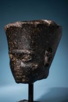 EGYPTIAN GRANODIORITE HEAD OF THE GOD AMUN WITH THE FEATURES OF KING TUTANKHAMUN