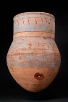 EGYPTIAN BLUE-PAINTED TERRACOTTA JAR WITH LOTUS PETALS