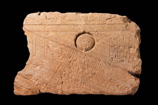 EGYPTIAN SANDSTONE RELIEF DEPICTING ATEN WITH THE CROWN OF THE KING