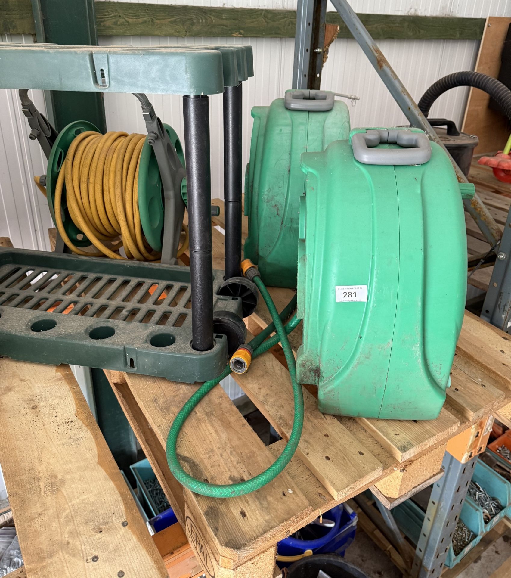 3 HOSE REELS AND A GARDEN TOOL STAND NO VAT