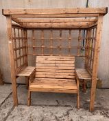 A WOODEN ARBOUR WITH A 2 SEATER BENCH + VAT