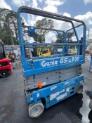 GENIE SCISSOR LIFT MODEL GS1930, ELECTRIC, APPROX MAX PLATFORM HEIGHT 19FT, BUILT IN BATTERY