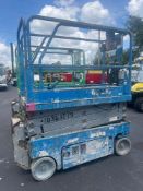 GENIE SCISSOR LIFT MODEL GS1930, ELECTRIC, APPROX MAX PLATFORM HEIGHT 19FT, BUILT IN BATTERY