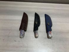 ( 3 ) UNUSED SMALL HANDMADE DAMASCUS KNIVES IN MOLD PROOF LEATHER SHEATHS, ASSORTED SIZES AND COL...