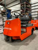 TOYOTA RIDE ON TUGGER MODEL CBT4, ELECTRIC, 48V, APPROX MAX DRAWBAR PULL 880LBS, NEEDS BATTERY