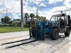 2014 GENIE TELEHANDLER MODEL GTH-5519; DIESEL POWERED; APPROX MAX LIFT CAPACITY W/ PALADIN ATTACH...
