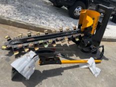 UNUSED TRENCHER ATTACHMENT FOR SKID STEER