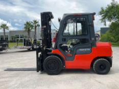 TOYOTA FORKLIFT MODEL 7FGU30, LP POWERED, ENCLOSED CAB, APPROX MAX CAPACITY 5800LBS, APPROX MAX H...