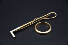 Goldene Brosche und 8K Ehering