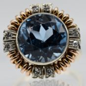 Ring mit blauem Farbstein und 8 Diamanten, zus. ca. 0,16 ct, 1. Hälfte 20. Jh.