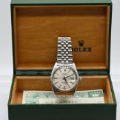 Herrenarmband, ROLEX „Datejust“, aus Stahl mit Papier, Kasten und Kaufbeleg von Juwelier Becker von