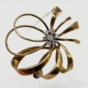 Brosche mit 7 Brillanten, zus. ca. 0,2 ct, 60er Jahre