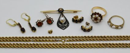1 Damenring GG 18ct. mit Perlen und Granate, 