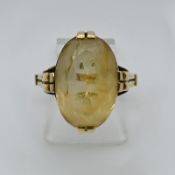 1 Damenring GG 14ct. wohl mit ovalem Citrin 