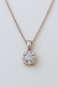 18K gold necklace with a diamond pendant totaling 0.30 carats