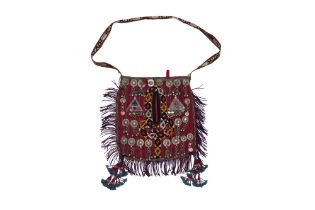 AN AFGHANI BAG WITH METAL CHARMS AND PATCHWORK Afghanistan, 20th century