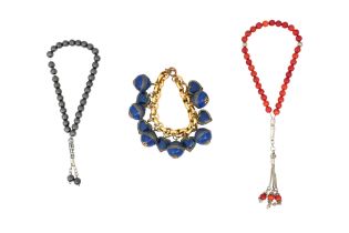 TWO PRAYER BEADS AND A BRACELET 20th century