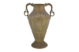 AN INDIAN BRASS TWIN HANDLED VASE India, early 20th century