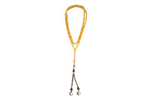 A TURKISH BUTTERSCOTCH AMBER 99 BEAD TASBIH ROSARY NECKLACE Turkey, possibly 20th century