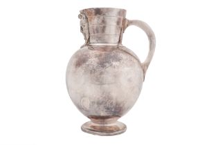 A SILVER-PLATED JUG WITH A MONOGRAM Circa 1900