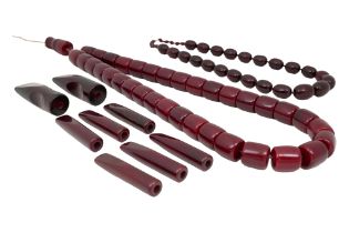 A LARGE QUANTITY OF CHERRY AMBER-STYLE BAKELITE PIECES 20th century