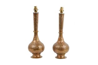 A PAIR OF INDIAN BRASS VASES MOUNTED AS LAMPS Modern
