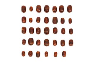 A QUANTITY OF RECONSTITUTED AMBER BEADS Modern