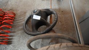 2 steering wheels and suspension springs