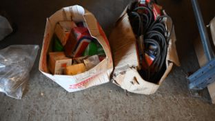 2 boxes of fan belts and oil filters