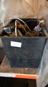 Black plastic box of various car components with green wooden box and contents