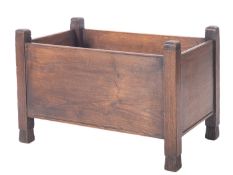 A chestnut and elm rectangular plant trough, with square section supports and fluted splayed feet,