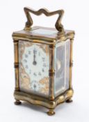 A French Edwardian Art Nouveau carriage alarm clock the eight-day duration timepiece movement