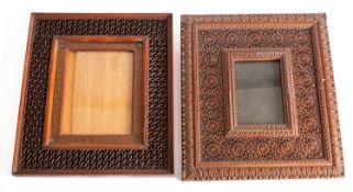 Two Levantine carved and stained wood rectangular photograph frames,