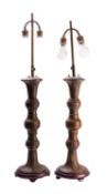 A pair of large Chinese bronzed metal table lamps,