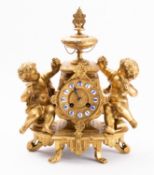 A mid-Victorian gilt-metal clock the eight-day duration movement striking the hours and half-hours