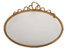 An Edwardian gilt framed oval mirror,