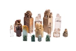 A mixed lot of Chinese carved hardstone, marble and glass chop and other seals,