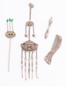 A group of four Chinese white metal items including a chateleine with attachments,