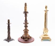 A carved and giltwood pricket stick in 17th century style,
