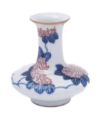 A small Chinese porcelain vase, of squat form with raised flaring neck,