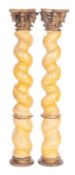 A pair of Italian carved, painted and parcel giltwood Solomonic columns,