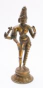An Indian bronze figure of Shiva, on a stepped lotus base, 28cm.