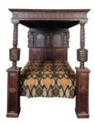 An Elizabethan oak half tester bed,